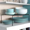 Image of Single Layer Kitchen Metal Shelf Organizer holding light blue plates and bowls in a modern kitchen setting.