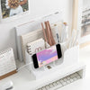 Plastic Stackable Office Desk Organizer with stationery and a phone, ideal for decluttering workspaces.