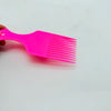 Wide-Tooth Hair Pick Comb in bright pink color, ideal for detangling and styling hair.