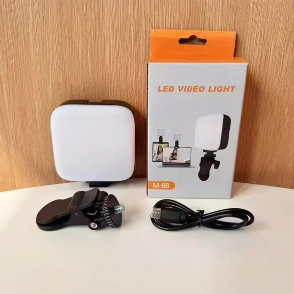 Rechargeable Clip-on LED Ring Selfie Light shown with packaging and accessories, ideal for enhancing video calls and content creation.
