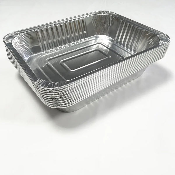 3100ml Aluminium Foil Roasting Tray stacked, perfect for baking and food transport in busy kitchens.
