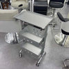 Aluminium Salon Trolley with three storage compartments and wheels, ideal for salon organization and mobility.