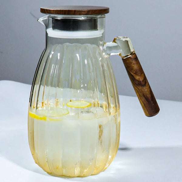 High-Temperature Resistant Dining Table Placemat with a refreshing drink and ice cubes in a glass pitcher.