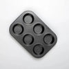 6 Cup Non-Stick Carbon Steel Muffin Pan with six evenly spaced muffin cavities for baking.