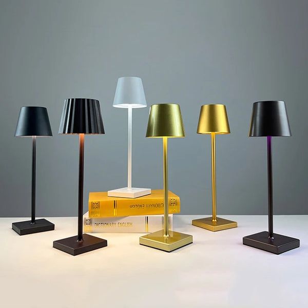 Portable LED touch table lamp collection featuring various colors and styles on display.