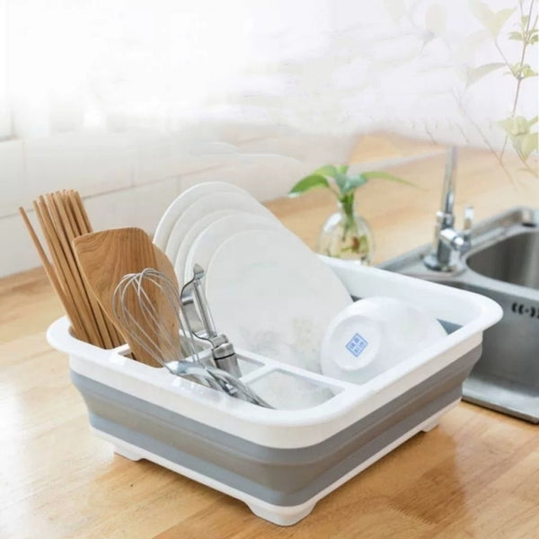 Collapsible Dish Drainer Dinnerware Portable Folding Rack with dishes and utensils in a kitchen setting.