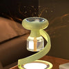 Portable Rechargeable Mosquito Trap Lamp on a nightstand, designed to attract and capture mosquitoes with UV light.