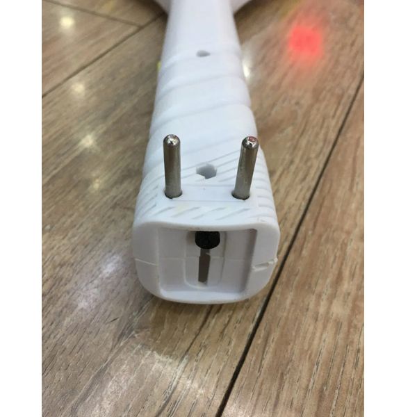 Palm Mesh Core Electric Mosquito Swatter plug with two prongs on a wooden surface.