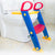 Adjustable Toddler Toilet Training Ladder Seat positioned by a toilet for comfortable toddler use and independence.