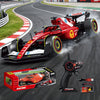 F1 App-Controlled High Speed RC Car on racetrack with controller and packaging, showcasing its racing features.