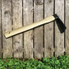 Carbon Steel Wooden Handle Garden Hoe against a wooden fence with green foliage below.