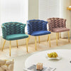 Luxury Rope Accent Dining Chair in teal, blue, and pink colors with gold legs in a bright living room.