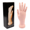 Flexible Soft Plastic Nail Art Practice Hand displayed next to its packaging in a studio setting.