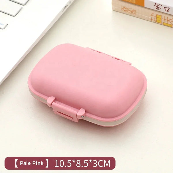 Weekly Pill Organizer Case in pale pink color measuring 10.5*8.5*3CM for medication management.