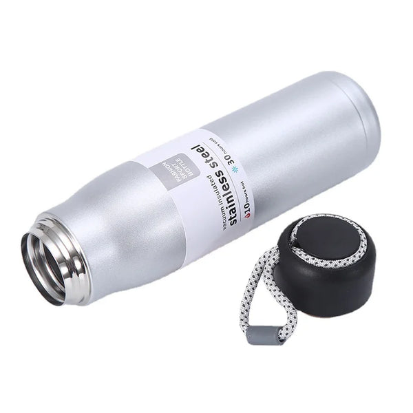 Stainless Steel Vacuum Insulated Flask with cap, sleek design ideal for keeping beverages hot and cold.