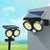 Outdoor Solar LED Garden Lamp with dual light heads and solar panel for efficient outdoor lighting.