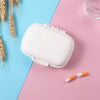 Weekly Pill Organizer Case for efficient medication management with pills on a colorful background.