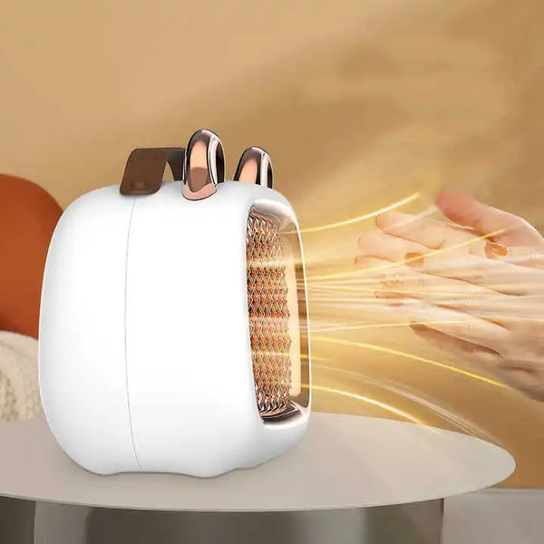 Customize Logo 1000W Energy Efficient Space Heater emitting warm air to heat hands.