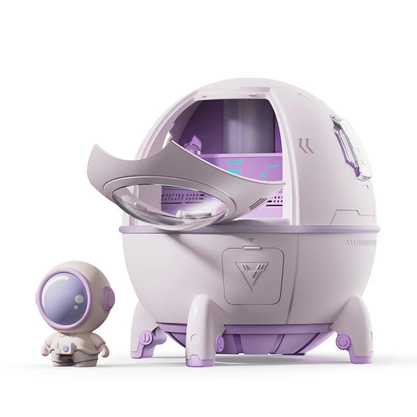 Space Capsule USB Mist Humidifier with Night Light and a small astronaut figurine displayed beside it.