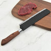 6 Piece Kitchen Cooking Knives Set displayed with a wooden handle knife and fresh meat on a cutting board.