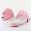 Baby Diaper Bag Baby Caddy Organizer Bed Mummy Backpack Bag with detachable canopy in pink.