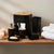 6-Piece Eco Friendly Kitchen Set displayed on wooden shelf with bamboo accents and black containers for sustainable home decor.