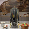 Stainless Steel Juicer Coffee Maker in a modern kitchen setting with salad and dessert.