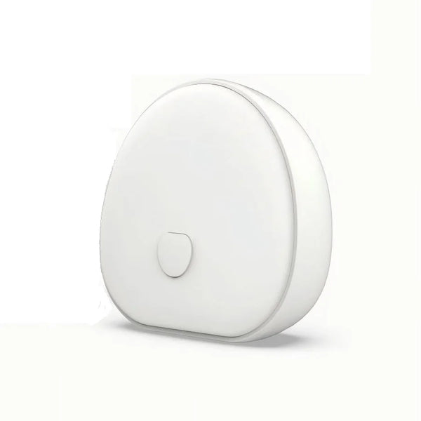 Portable White Noise Sound Machine in a compact design for creating a calming sleep environment.
