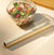 Ultra Clear Food Grade Anti-Fog Cling Film wrapped around a bowl of fresh salad with a roll beside it.