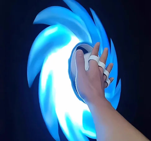 Person holding a 3D Printed Glowing Rotatable Ace Ring Toy with vibrant blue light effect.