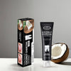 Coconut Charcoal Toothpaste Mint Extract packaging with coconut on a gray background, promoting natural whitening.