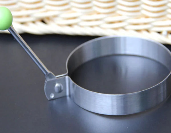 Egg Mold Pan Ring, stainless steel kitchen tool for shaping fried eggs, omelettes, and pancakes.