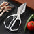 Strong Big Head Kitchen Scissors on a cutting board with vegetables and chicken feet.