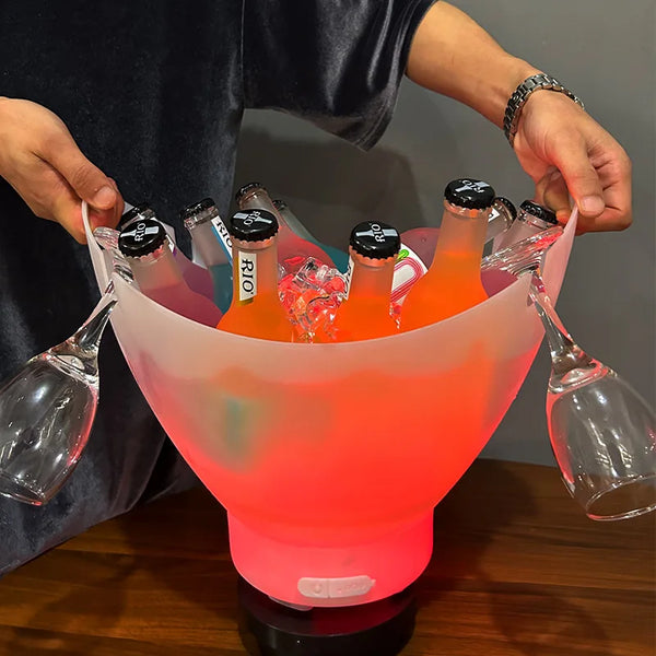 7L Bluetooth LED Ice Bucket with Speaker and Light Effects holding drinks and glasses, illuminated in vibrant colors.