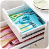 Multi-Purpose Anti-Slip Shelf & Fridge Mat 6-Pack inside a drawer organizing tools and utensils.