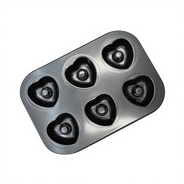Non-Stick Heart Shaped 6-Cup Muffin Tray for baking heart-shaped treats.