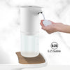 Automatic Soap Dispenser dispensing soap while hands receive a foam bubble on a countertop.