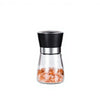 Stainless Steel Salt and Pepper Grinder displayed with pink Himalayan salt inside for flavorful seasoning.