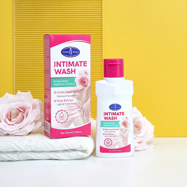 Natural pH Balanced Rose Intimate Wash product packaging next to a bottle on a colorful background with roses.