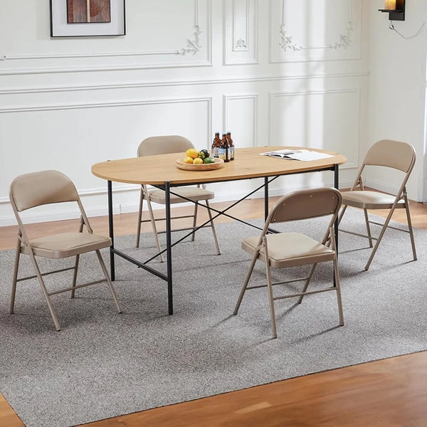 Black Padded Folding Chair with Steel Frame around a dining table, complementing the modern interior design.
