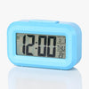 Smart Digital LCD Desk Clock with Temperature Display in blue, showing time and temperature.
