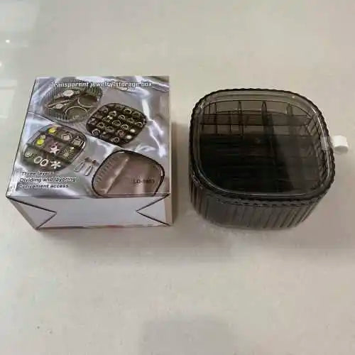 Image of a 3-Layer Jewelry Storage Box and its packaging showcasing compartments for organized accessory storage.