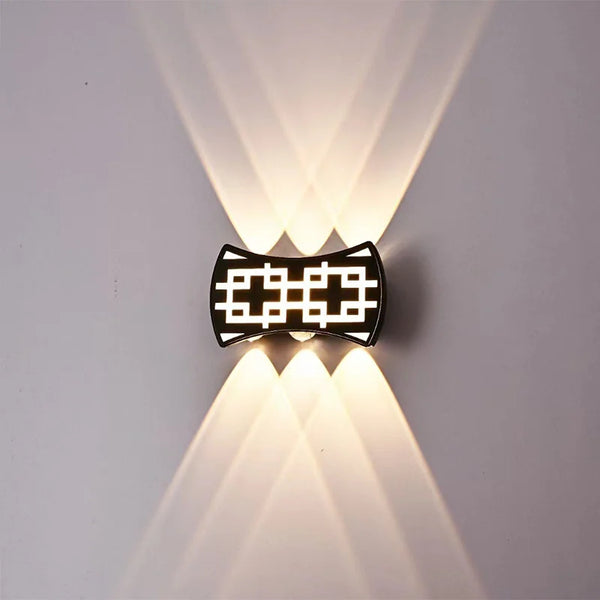 Waterproof Square Aluminum Tempered Glass LED Wall Light illuminating a wall with modern design and ambient lighting.
