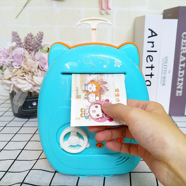 Suitcase Design Piggy Bank ATM Money Safe Box for Money with a hand inserting cash into the colorful ATM-style storage.