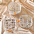 Portable Multi-Layer Plastic Jewelry Storage Box in three sections displaying organized earrings and rings.