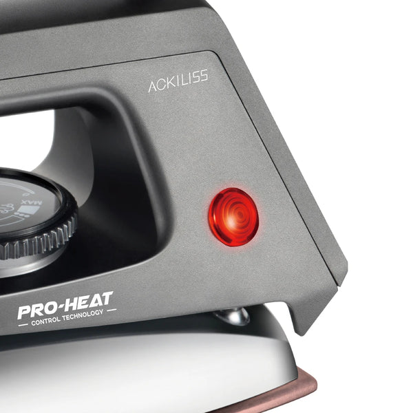 Close-up of the handle and control features of a 1000W Electric Dry Iron highlighting the Pro-Heat control technology.