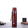 600ml Stainless Steel Thermos Bottle in red, perfect for keeping drinks hot or cold.