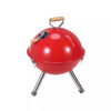 Portable Stainless Steel Charcoal BBQ Grill in vibrant red color with wooden handle and tripod legs.