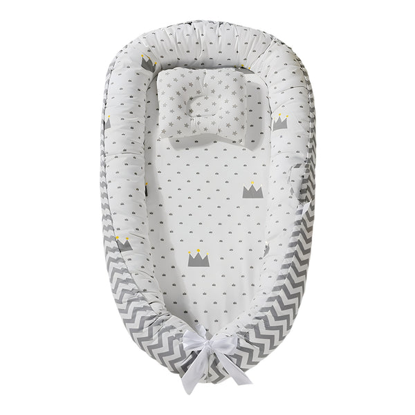 Cotton Adjustable Baby Lounger Nest Cover with crown patterns and soft cushioning for baby's comfort and security.
