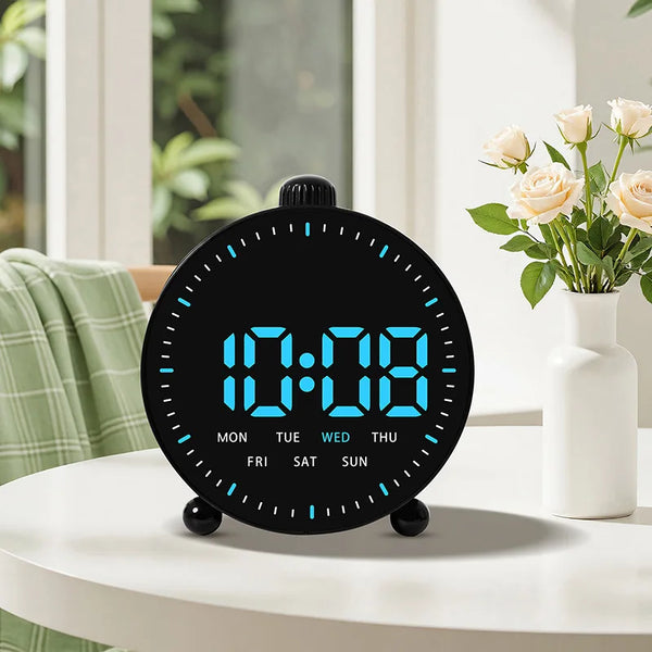 Table Smart Smart Alarm Clock displaying time and day on a sleek design in a modern home setting.